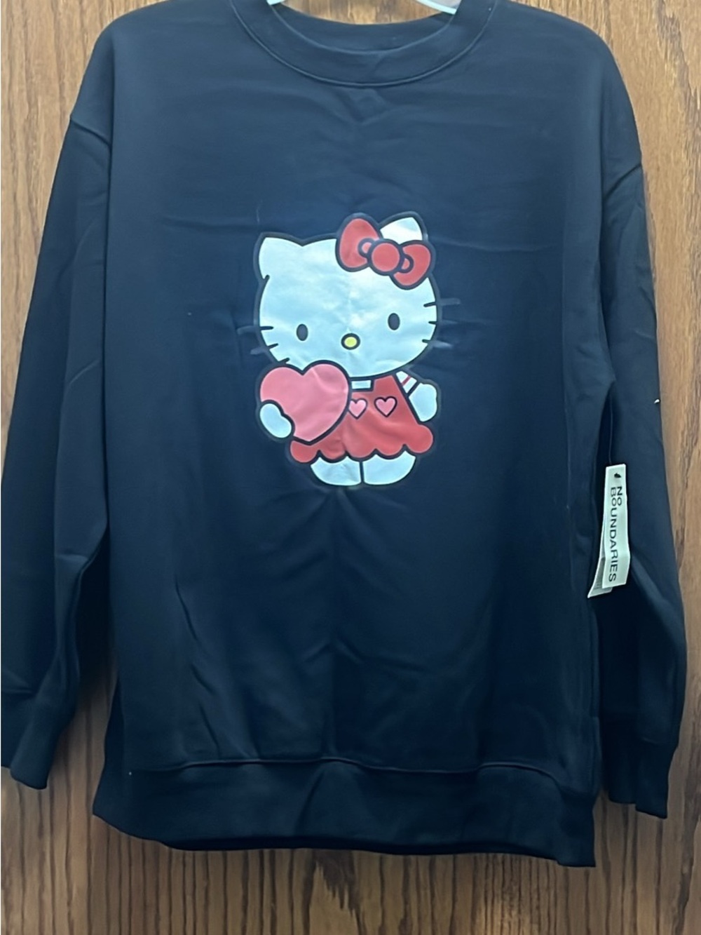No Boundaries Black Hello Kitty Graphic Crewneck with Pink Accents